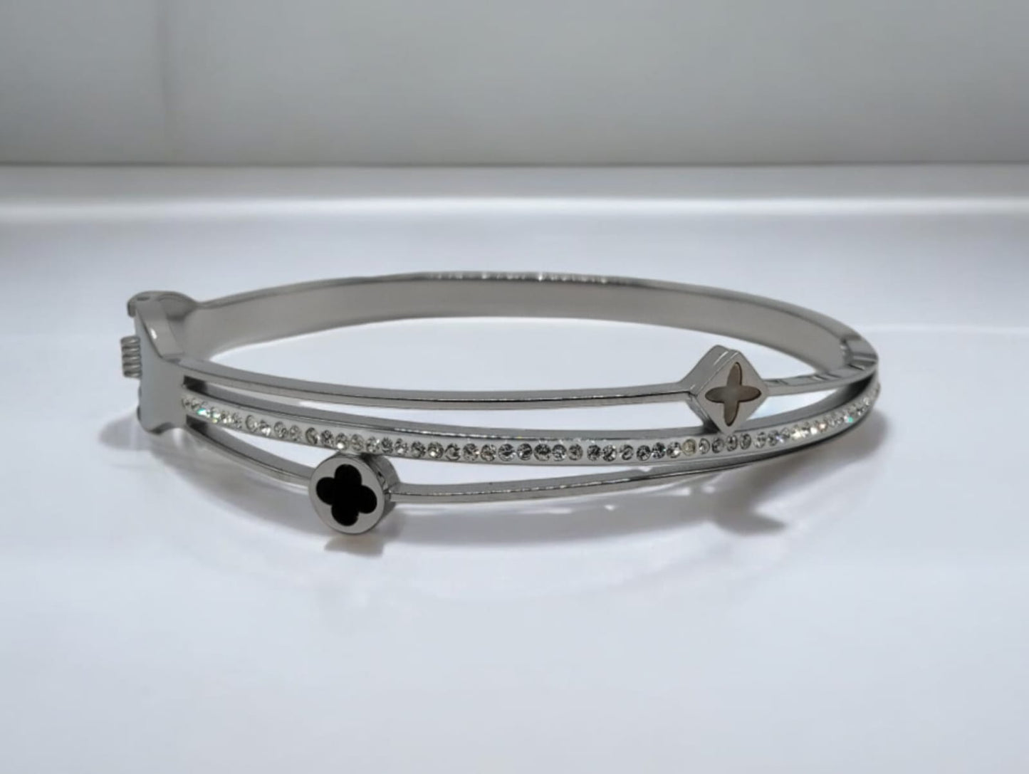 Aura Stelle stone studded gold plated bangle bracelet