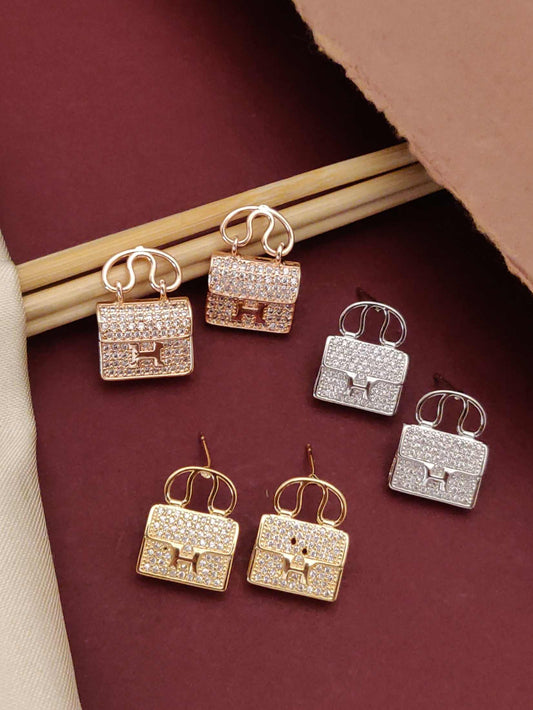 Chic Harmony: The Earring & Purse Duo